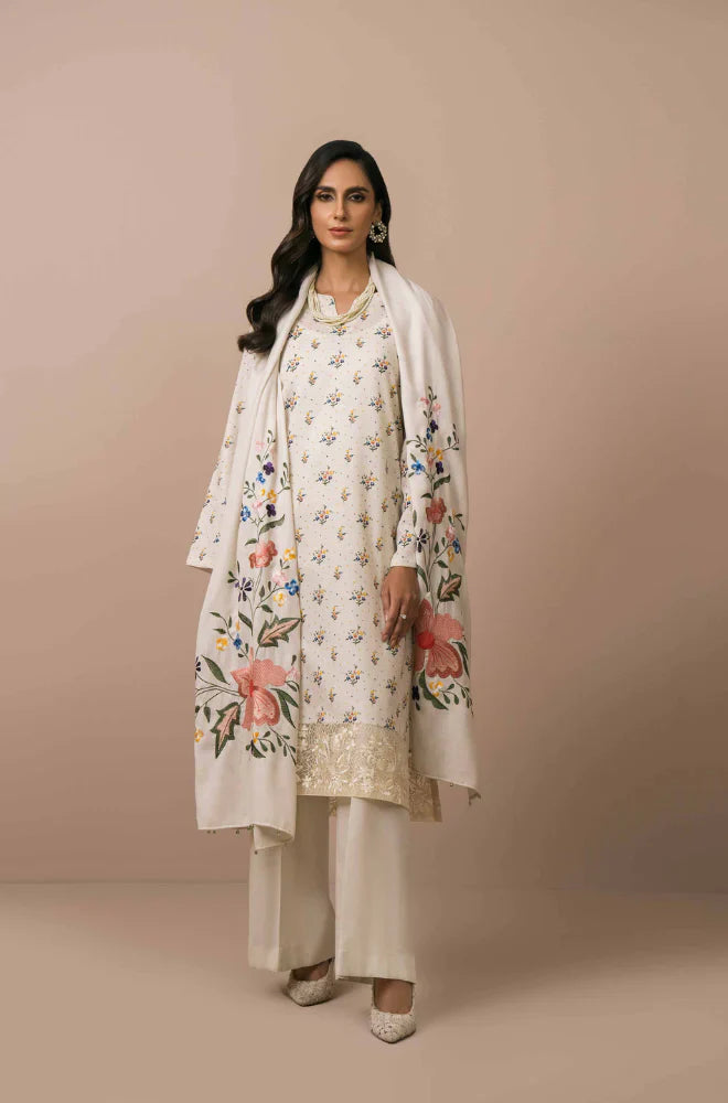 Woman wearing a floral outfit with a beige background