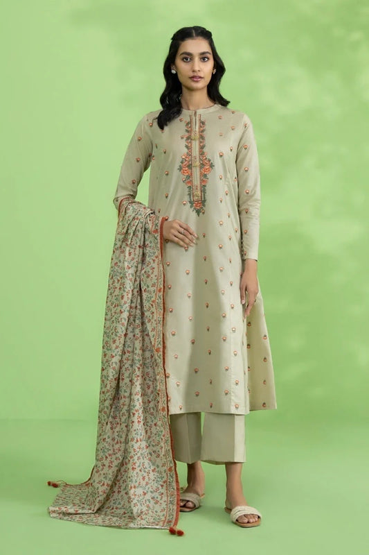 Woman wearing a traditional outfit with a green background